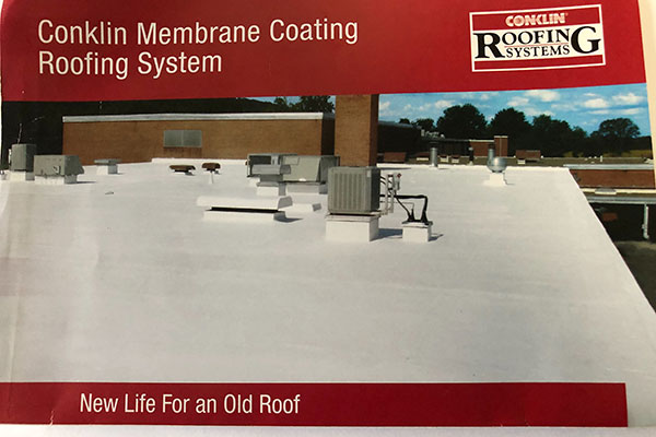 roofing membrane coating system