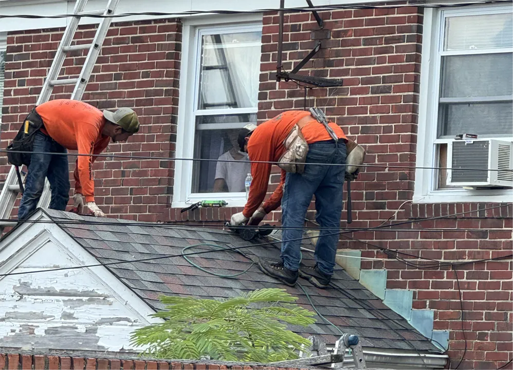 kangaroof-18 Licensed roofing contractor working on residential roof in Clarksville MD